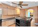 Spacious bar area showcasing custom cabinets, great lighting and dark countertops at 2945 Lake Pineloch Blvd # 18-26, Orlando, FL 32806