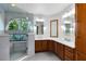 Spacious bathroom with custom vanities and a large glass shower at 2945 Lake Pineloch Blvd # 18-26, Orlando, FL 32806