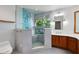 Elegant bathroom with a glass-enclosed shower and custom vanity at 2945 Lake Pineloch Blvd # 18-26, Orlando, FL 32806