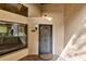 Inviting front entrance featuring a secure, decorative metal door and brick flooring at 2945 Lake Pineloch Blvd # 18-26, Orlando, FL 32806