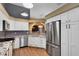 Modern kitchen with granite countertops and stainless steel appliances at 2945 Lake Pineloch Blvd # 18-26, Orlando, FL 32806