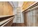 Spacious wood-lined walk-in closet with lots of built-in storage and shelves at 2945 Lake Pineloch Blvd # 18-26, Orlando, FL 32806