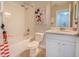 Bathroom featuring a shower/tub combo, vanity, and Mickey Mouse themed decor at 2985 Buccaneer Palm Rd, Kissimmee, FL 34747