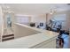 Home gym with modern exercise equipment, wood floors and natural lighting at 2985 Buccaneer Palm Rd, Kissimmee, FL 34747