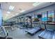 Well-equipped gym featuring treadmills, elliptical machines, free weights, and mirrors at 2985 Buccaneer Palm Rd, Kissimmee, FL 34747