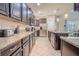 Contemporary kitchen with granite countertops and stainless steel appliances at 2985 Buccaneer Palm Rd, Kissimmee, FL 34747