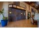 Grand entry to the Paradise Palms Cinema with double doors and classic signage at 2985 Buccaneer Palm Rd, Kissimmee, FL 34747