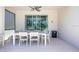 Inviting outdoor patio space perfect for dining with seating for at least six people at 2985 Buccaneer Palm Rd, Kissimmee, FL 34747