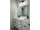 Bathroom featuring a double sink vanity with black hardware and quartz countertops at 3063 Sw 168Th Loop, Ocala, FL 34473