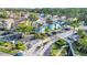 Aerial view of the gated community entrance with well-maintained landscaping at 3157 Britannia Blvd # B, Kissimmee, FL 34747