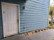 Entrance to the property, highlighting a white front door with unit number at 3157 Britannia Blvd # B, Kissimmee, FL 34747