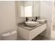 Bright bathroom with double vessel sinks, stylish vanity, and modern fixtures at 346 Bowfin Ct, Kissimmee, FL 34759