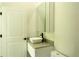 Bathroom with modern vanity, sleek vessel sink, and a mirrored medicine cabinet at 346 Bowfin Ct, Kissimmee, FL 34759