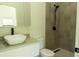 Bathroom with a vessel sink, modern vanity, and a tiled shower at 346 Bowfin Ct, Kissimmee, FL 34759