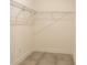 Walk-in closet with shelving and tiled flooring at 346 Bowfin Ct, Kissimmee, FL 34759