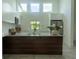 Bright kitchen with a kitchen island, stainless steel appliances, and natural light at 346 Bowfin Ct, Kissimmee, FL 34759