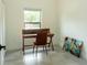 Small office room with desk near window, and art on the floor at 346 Bowfin Ct, Kissimmee, FL 34759