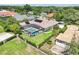 An aerial view of the pool and backyard is highlighted in this listing at 356 N Spaulding Cv, Lake Mary, FL 32746