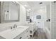 Bathroom featuring double sink vanity, shower, bathtub and tiled flooring at 356 N Spaulding Cv, Lake Mary, FL 32746