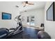 Well lit exercise room featuring gym equipment and views of the pool area at 356 N Spaulding Cv, Lake Mary, FL 32746