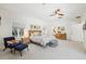 A bright, stylish main bedroom with a ceiling fan, and lots of natural light at 356 N Spaulding Cv, Lake Mary, FL 32746