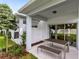 Covered patio area featuring modern outdoor seating is a perfect outdoor living space for relaxation and entertaining at 3610 Raindrop Way, Sanford, FL 32773