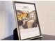 Framed picture showcasing a well-decorated bedroom with a king bed and nature themed mural at 3880 Sonoma Blvd, Kissimmee, FL 34741