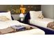 ' bedroom featuring twin beds with Lego themed artwork and wall decor at 3880 Sonoma Blvd, Kissimmee, FL 34741