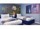 Colorful ' bedroom with twin beds and Lego-themed wall art at 3880 Sonoma Blvd, Kissimmee, FL 34741