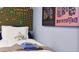 Cozy bedroom featuring colorful decor and comfortable bed at 3880 Sonoma Blvd, Kissimmee, FL 34741
