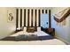 Stylish bedroom featuring a modern design, comfortable bed, and decorative wall art at 3880 Sonoma Blvd, Kissimmee, FL 34741