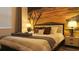 Comfortable bedroom with unique wall art and stylish bedside lamps on matching nightstands at 3880 Sonoma Blvd, Kissimmee, FL 34741
