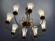 Elegant ceiling chandelier featuring multiple white glass bulbs at 3880 Sonoma Blvd, Kissimmee, FL 34741