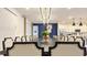 Spacious dining area with a large dining table, modern lighting, and seamless open-concept design at 3880 Sonoma Blvd, Kissimmee, FL 34741