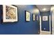 Hallway with art pieces, adding character and style to the home's design at 3880 Sonoma Blvd, Kissimmee, FL 34741