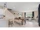 Bright open-concept kitchen, dining, and living area perfect for entertaining with natural light at 405 Meadowland Pt, Oviedo, FL 32765