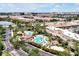 A view of resort complex with pools, landscaping, and nearby shopping and entertainment at 4114 Breakview Dr # 30702, Orlando, FL 32819
