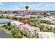 Aerial view of 4114 Breakview #307, near Epic Universe and surrounding condos, water, and cityscape at 4114 Breakview Dr # 30702, Orlando, FL 32819