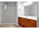 Well-lit bathroom features a glass-enclosed shower and sleek vanity with neutral color scheme at 4114 Breakview Dr # 30702, Orlando, FL 32819