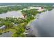 Aerial view of the property at 4536 N Landmark Drive near Trinity Preparatory School and a beautiful lake at 4536 N Landmark Dr, Orlando, FL 32817