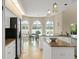 Beautiful kitchen offering ample counter space, modern appliances, and a view of the backyard, blending style and functionality at 4536 N Landmark Dr, Orlando, FL 32817