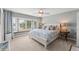 Charming main bedroom with a bay window, comfortable seating, and ample natural light at 4536 N Landmark Dr, Orlando, FL 32817