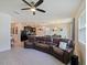 Open concept living area features view from living room to kitchen and dining area at 4553 Baler Trails Dr, St Cloud, FL 34772