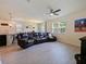 Open concept living area features view from living room to kitchen and dining area at 4553 Baler Trails Dr, St Cloud, FL 34772