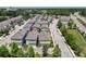 Aerial view of a community with well-maintained streets and landscaping at 4630 Socrates Way, Sanford, FL 32773