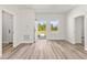 Bright entryway featuring an open door to the outside and natural light at 501 Marion Oaks Golf Way, Ocala, FL 34473