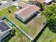 Aerial view of a home with a fenced backyard and a well-maintained lawn at 5210 Poinsetta Ave, Winter Park, FL 32792