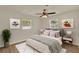 Light and airy bedroom showcasing neutral tones and plenty of natural light at 5210 Poinsetta Ave, Winter Park, FL 32792