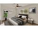 Warm bedroom with a comfy bed, modern decor, and plenty of natural light at 5210 Poinsetta Ave, Winter Park, FL 32792