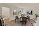 Dining room features a round table with a flower centerpiece at 5210 Poinsetta Ave, Winter Park, FL 32792